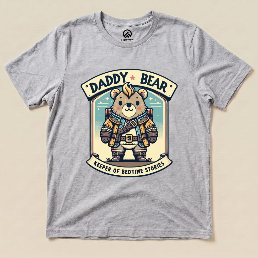 The "Daddy Bear Shirt" features a cute bear graphic dressed in explorer attire with the slogan "Keeper of Bedtime Stories.