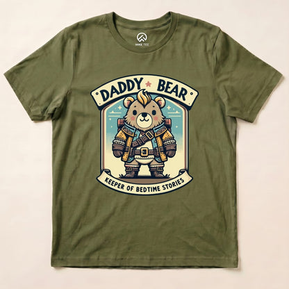 A graphic t-shirt featuring a bear in a rugged outfit with the words "Daddy Bear" and "Keeper of Bedtime Stories.