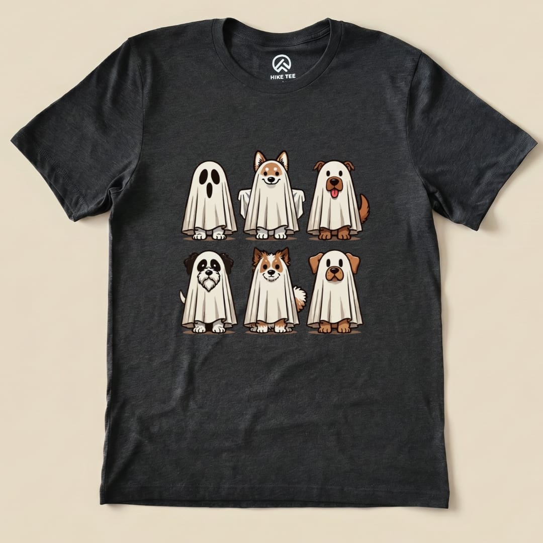 A graphic t-shirt featuring a fun design of six dogs dressed as ghosts, labeled as the "Dog Ghosts Shirt.