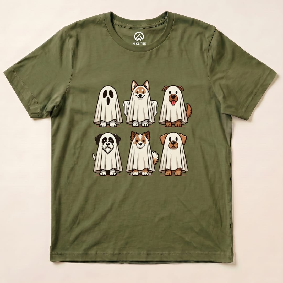 The Dog Ghosts Shirt features six playful dogs dressed as ghosts, printed on an olive green graphic t-shirt.