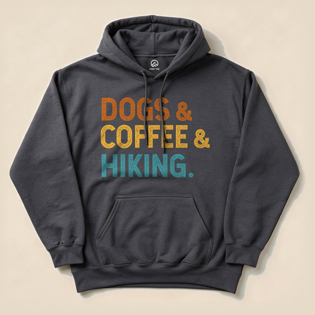 Dark Heather Dogs & Coffee & Hiking Hoodie with bold retro text