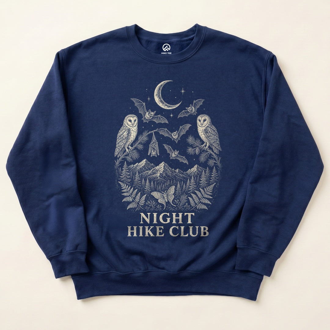 Navy Night Hike Club Engraved Sweatshirt with owls, bats and a crescent moon over the mountains graphic