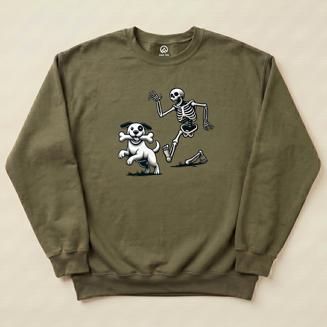 A graphic sweatshirt featuring a playful skeleton and a dog holding a bone, titled "Skeleton and Dog Halloween Sweatshirt.