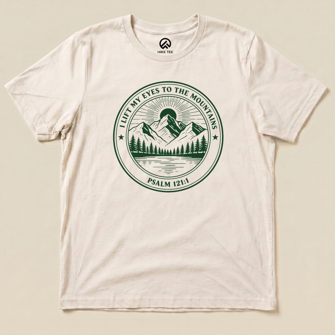 Natural I Lift My Eyes to the Mountains Shirt with a mountain lake badge with Psalm 121:1 graphic