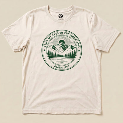 Natural I Lift My Eyes to the Mountains Shirt with a mountain lake badge with Psalm 121:1 graphic