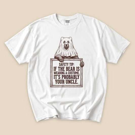 White Bear Safety Tip T-Shirt with a bear in a ghost costume and a funny safety tip graphic