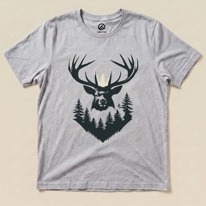 A graphic t-shirt featuring an elk's head with prominent antlers surrounded by trees, showcasing the "Elk Shape Shirt" design.