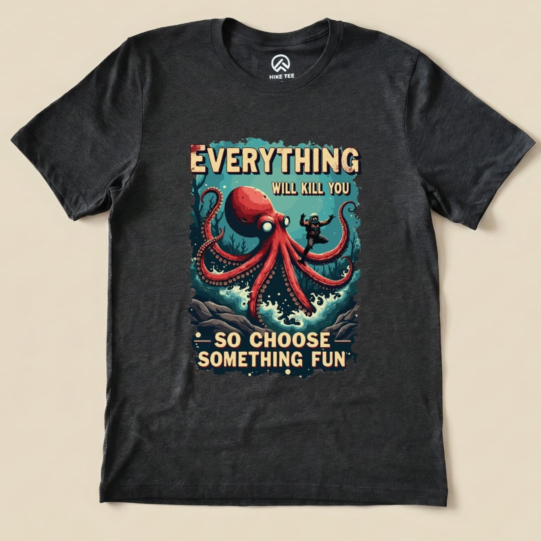 The graphic t-shirt features a vibrant print of an octopus and a hiker, with the slogan "Everything Kills You - So Choose Something Fun.