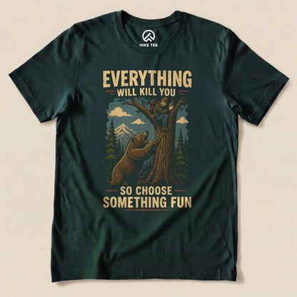 Forest Everything Will Kill You Shirt with a bear chasing a hiker up a tree graphic