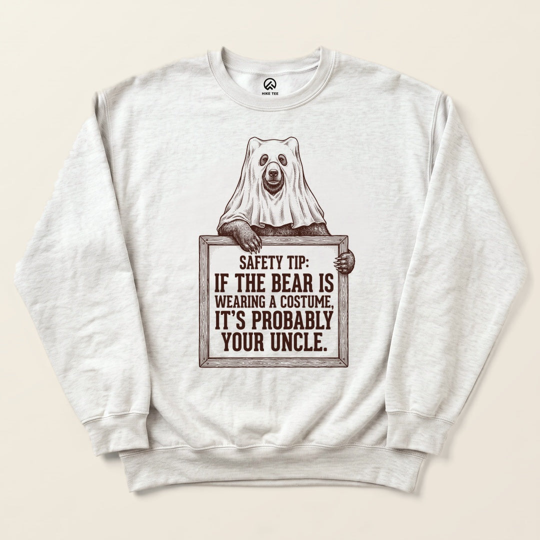 Ash Bear Safety Tip Sweatshirt with a bear in a ghost costume holding a safety tip sign graphic