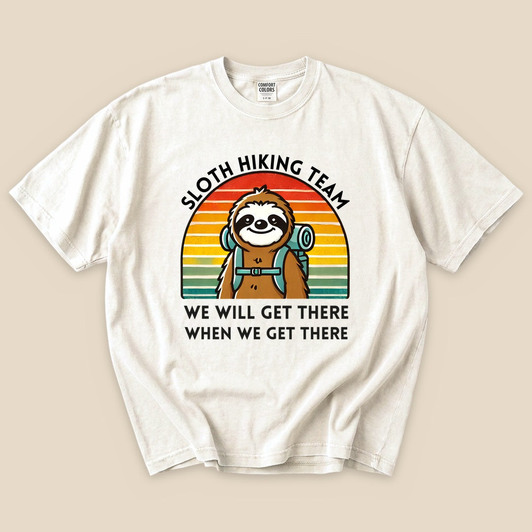 Ivory Sloth Hiking Team T-Shirt with a backpacking sloth and retro sunset graphic