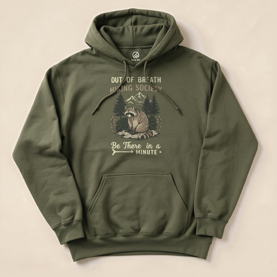Military Green Out of Breath Hiking Society Raccoon Hoodie with a funny raccoon hiking graphic