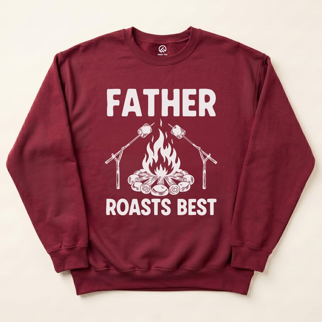 A maroon "Father Roasts Best" sweatshirt features a campfire graphic with marshmallows on sticks above the slogan.