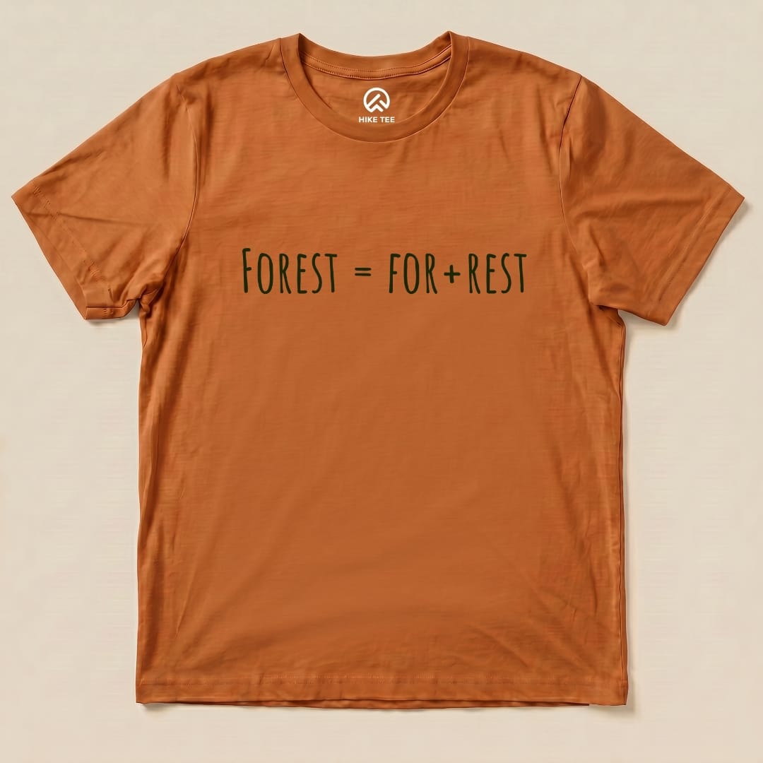 The graphic t-shirt in a burnt orange color features the slogan "FOREST = FOR + REST" printed in dark green.