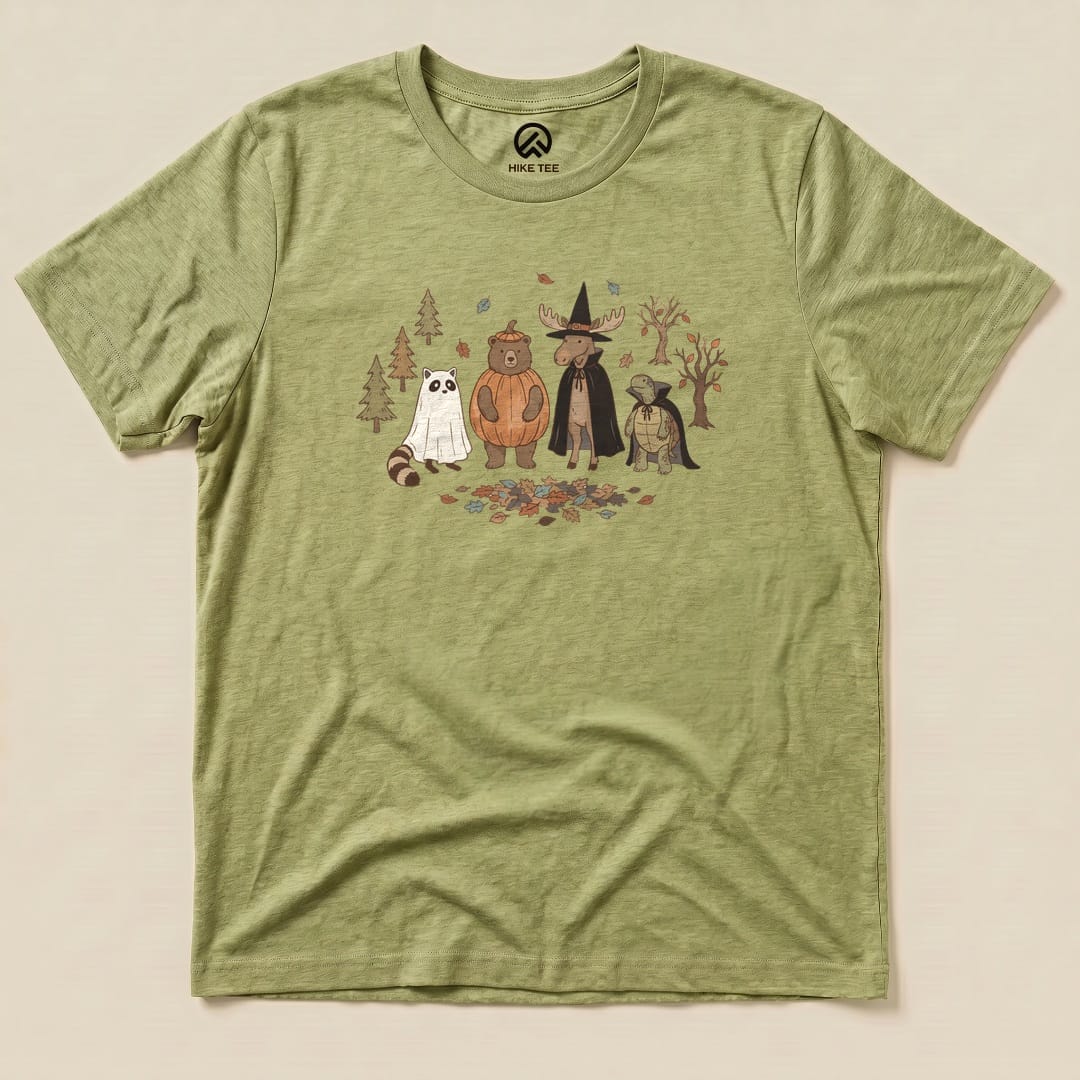 The graphic t-shirt features a whimsical illustration of forest animals in costumes, titled "Forest Friends Costume Party Shirt.