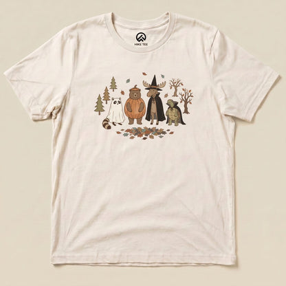 The graphic t-shirt features a whimsical "Forest Friends Costume Party Shirt" design with cartoon animals in costumes among trees and leaves.
