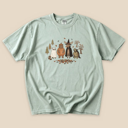 The graphic t-shirt features a "Forest Friends Costume Party T-Shirt" design with cartoon animals dressed for a party among trees and leaves.