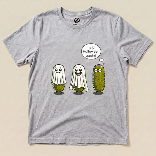 A graphic t-shirt featuring three pickle characters dressed as ghosts with the text "Is it Halloween again?" on a gray background, labeled as "Funny Pickle Ghost Shirt.