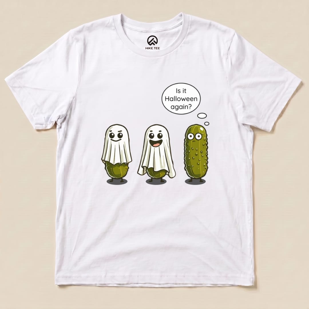 A white graphic t-shirt features three cute ghostly pickles, with the text, "Is it Halloween again?" on the Funny Pickle Ghost Shirt.