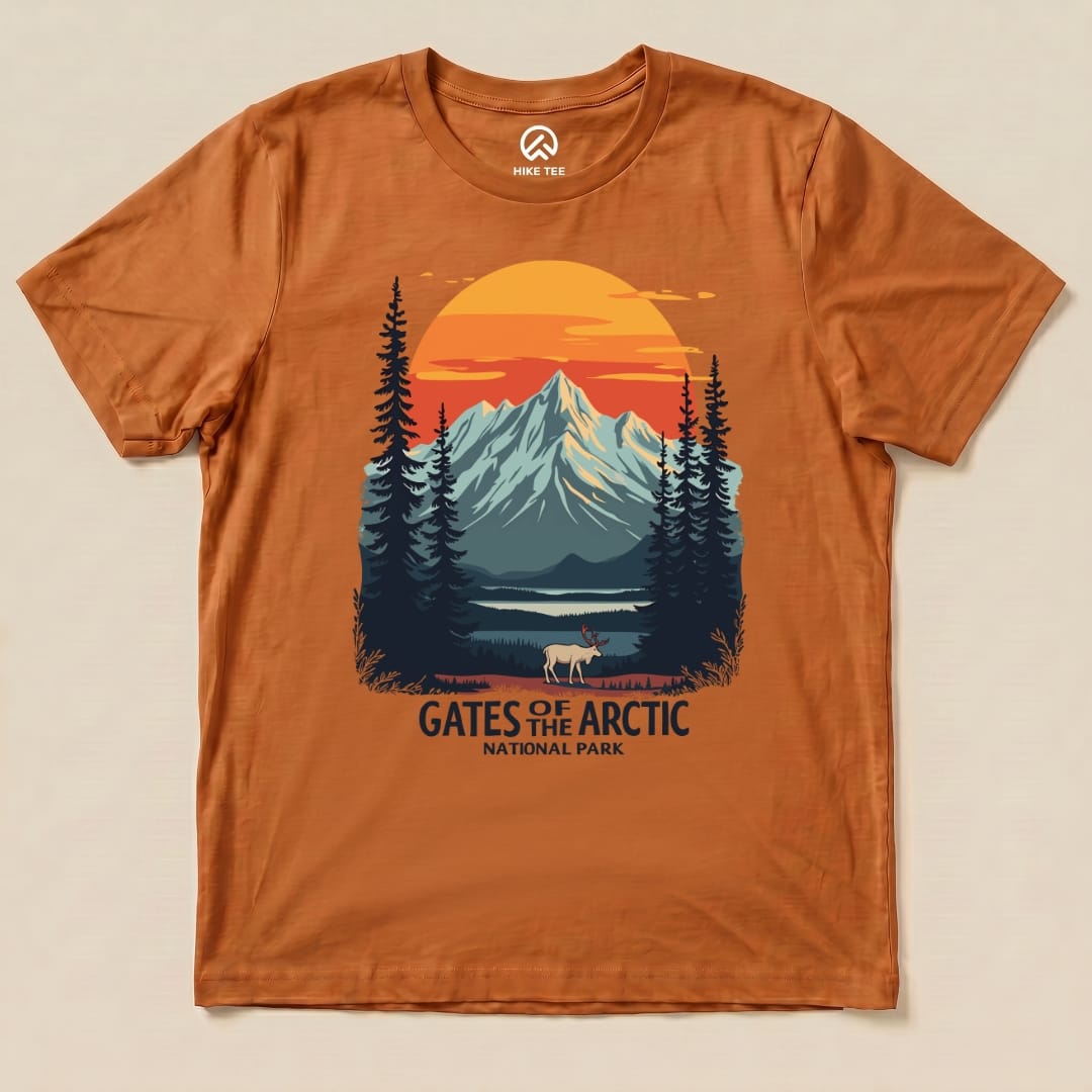 The graphic t-shirt features an illustration of mountains, trees, and a caribou, with the text "Gates of the Arctic National Park Shirt.