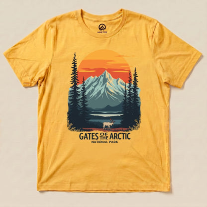 The yellow graphic t-shirt features a scenic design with mountains, pine trees, and a grazing caribou, labeled "Gates of the Arctic National Park.