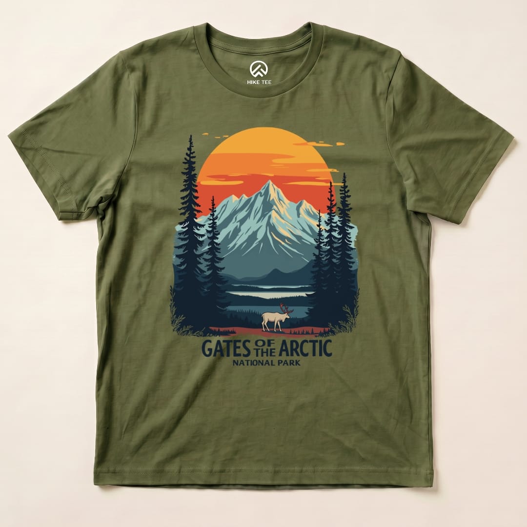 The graphic t-shirt features a scenic design with mountains, trees, and a caribou, labeled "Gates of the Arctic National Park.