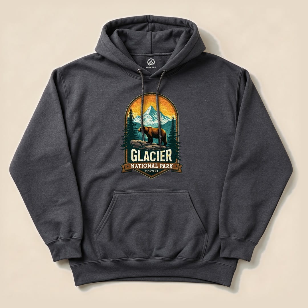 Dark Heather Glacier Grizzly Bear Hoodie with a vintage national park badge graphic