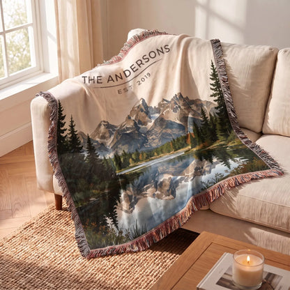 Grand Teton Schwabacher Landing Woven Blanket draped over a sofa