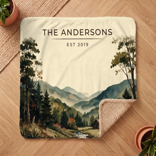 Graphic blanket featuring a serene mountain landscape and personalized text, showcasing the Great Smoky Mountains Cabin Sherpa Blanket.