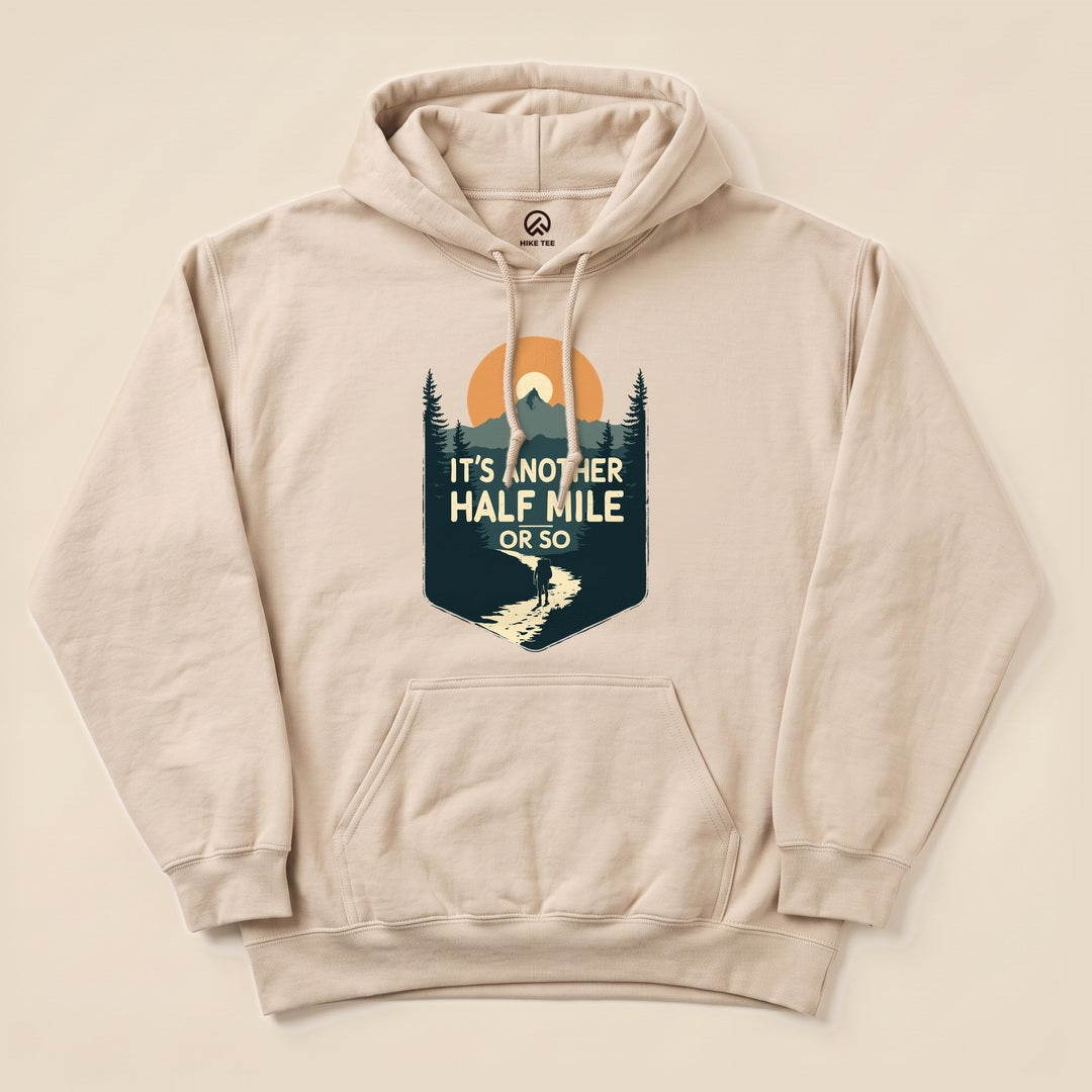 Sand Half Mile Hoodie with a mountain badge graphic