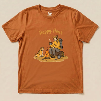 Graphic t-shirt featuring a person sitting by a campfire with a dog, captioned "Happy Hour" in a playful design.