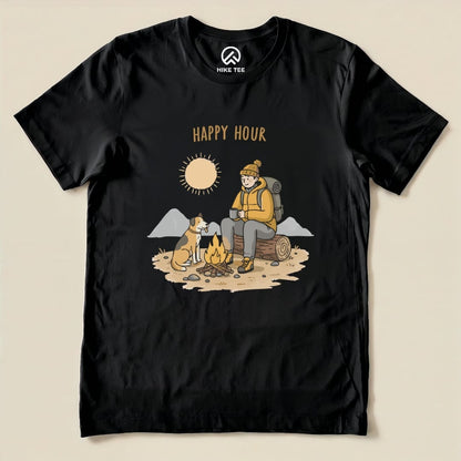 A graphic t-shirt featuring a cozy camping scene with a smiling man, a dog, a campfire, and the text "HAPPY HOUR.