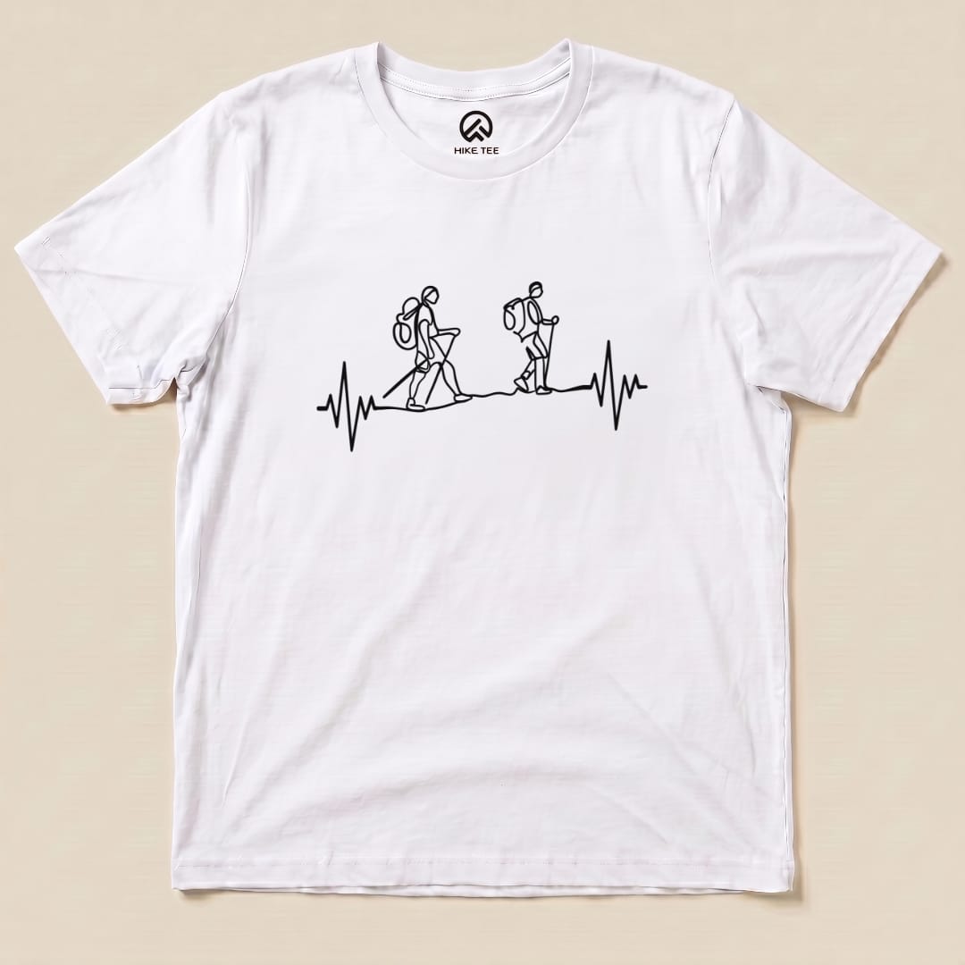 A graphic t-shirt featuring a minimalist line drawing of two hikers with backpacks and a heartbeat line, labeled "Heart Rate Hiking Shirt".