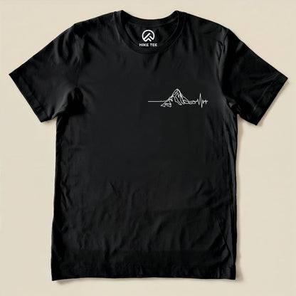 A black graphic t-shirt features a minimalistic mountain design and an EKG line, labeled as the Heart Rate Mountain Shirt.