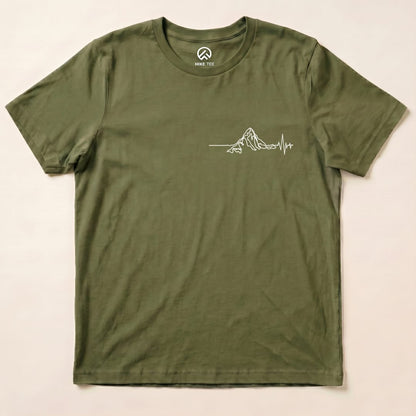 An olive green graphic t-shirt featuring a minimalist mountain outline with a heartbeat line underneath, labeled "Heart Rate Mountain Shirt".