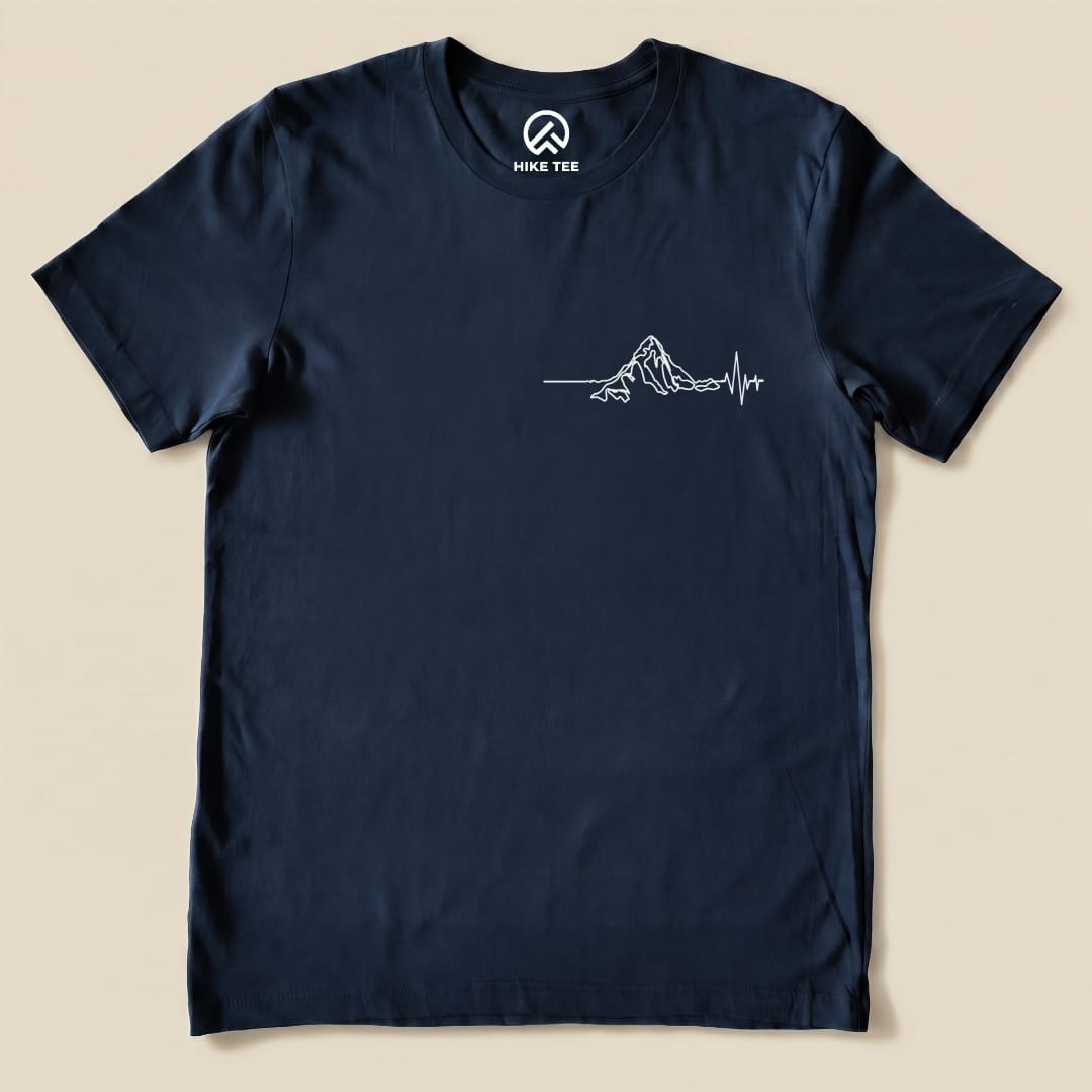 A navy graphic t-shirt featuring a minimalistic mountain design with a heartbeat line, labeled as the "Heart Rate Mountain Shirt.