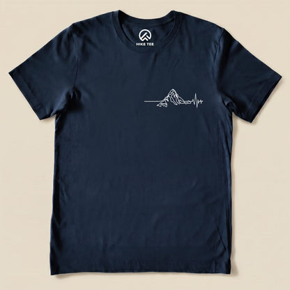 A navy graphic t-shirt featuring a minimalistic mountain design with a heartbeat line, labeled as the "Heart Rate Mountain Shirt.