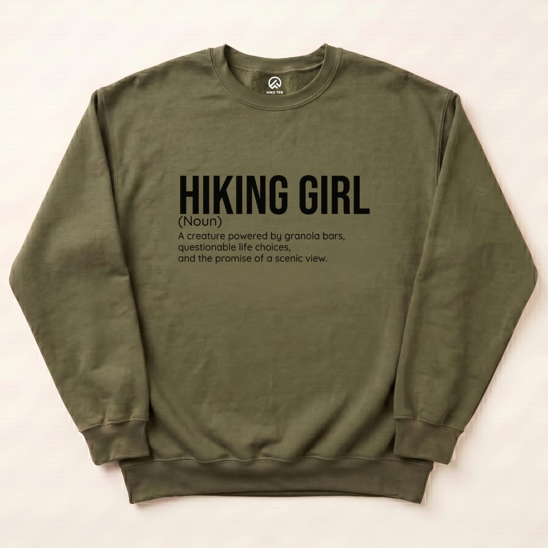 An olive green "Hiking Girl Definition Sweatshirt" showcases bold text defining a hiking girl with playful phrases about granola bars and scenic views.