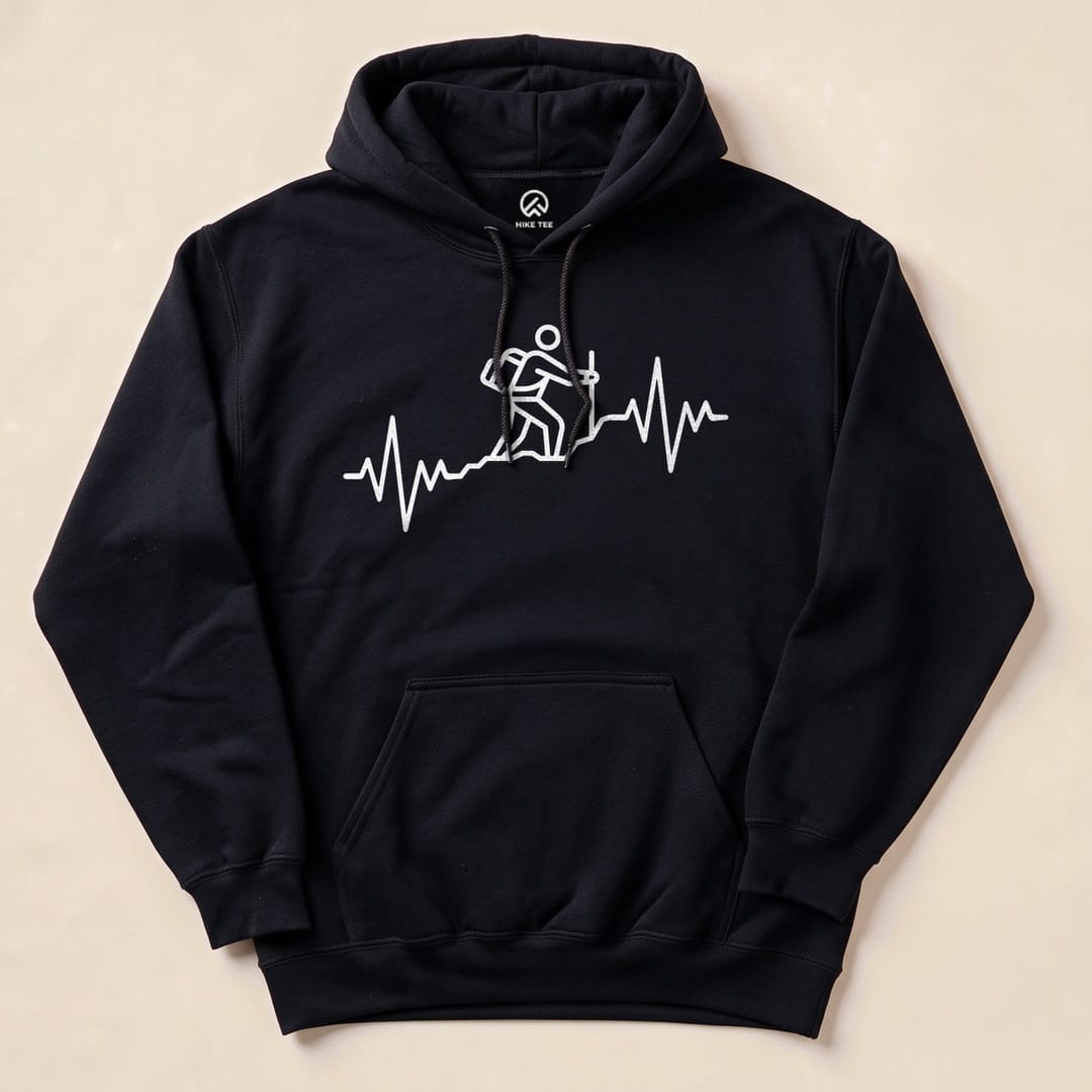 A black "Hiking Heart Rate Hoodie" features a white graphic of a hiker on a heartbeat line, symbolizing outdoor adventure.