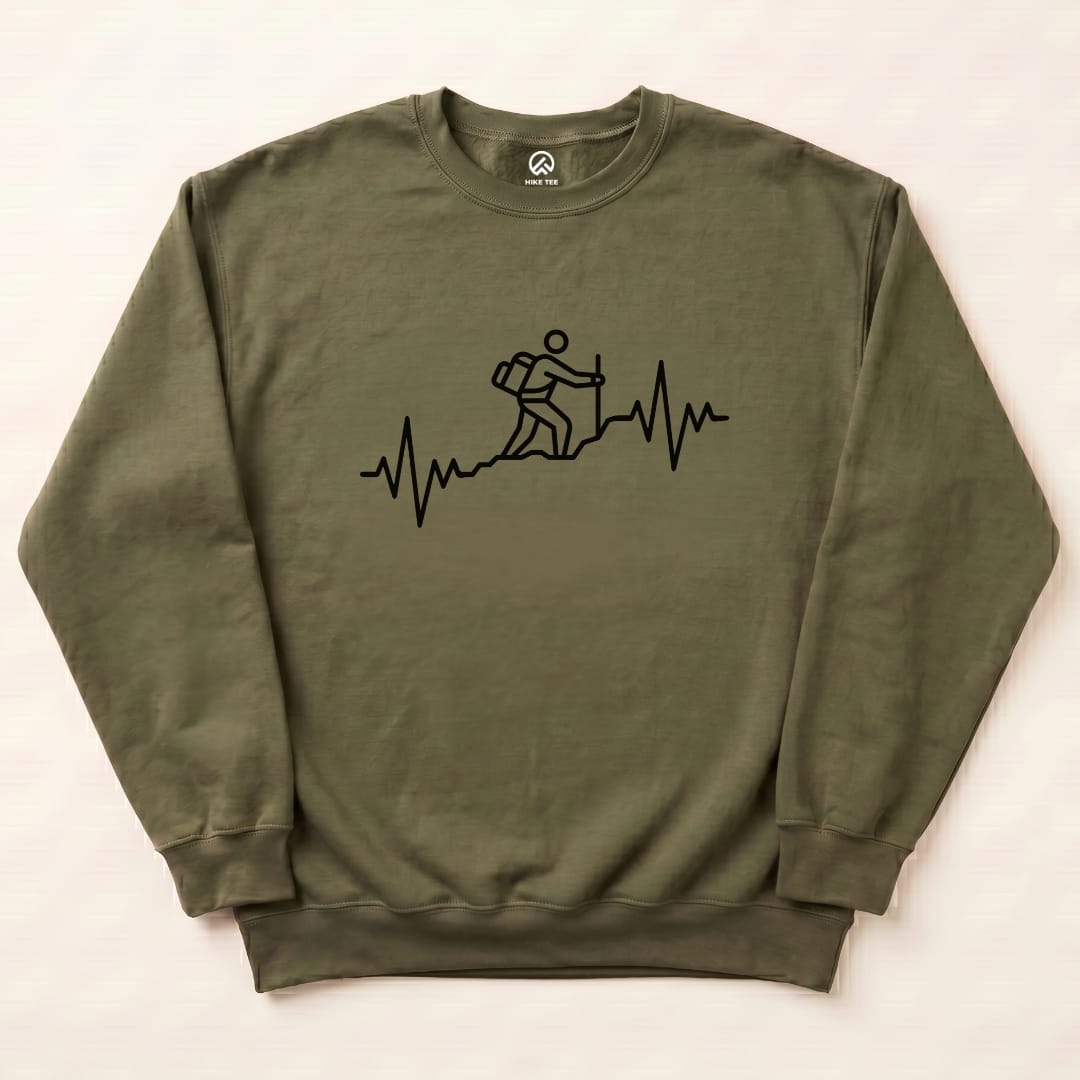 The olive green "Hiking Heart Rate Sweatshirt" features a graphic of a hiker against a heartbeat line, representing outdoor adventure.