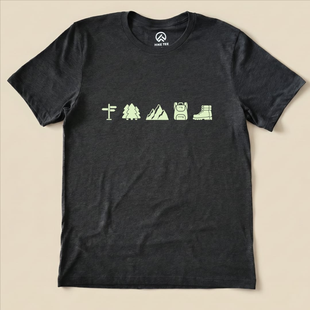 The Hiking Mini Shirt features a graphic of outdoor icons including a signpost, trees, mountains, a backpack, and hiking boots.