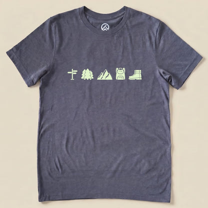 The Hiking Mini Shirt is a graphic t-shirt in dark gray featuring glowing icons of a signpost, trees, mountains, a backpack, and hiking boots.