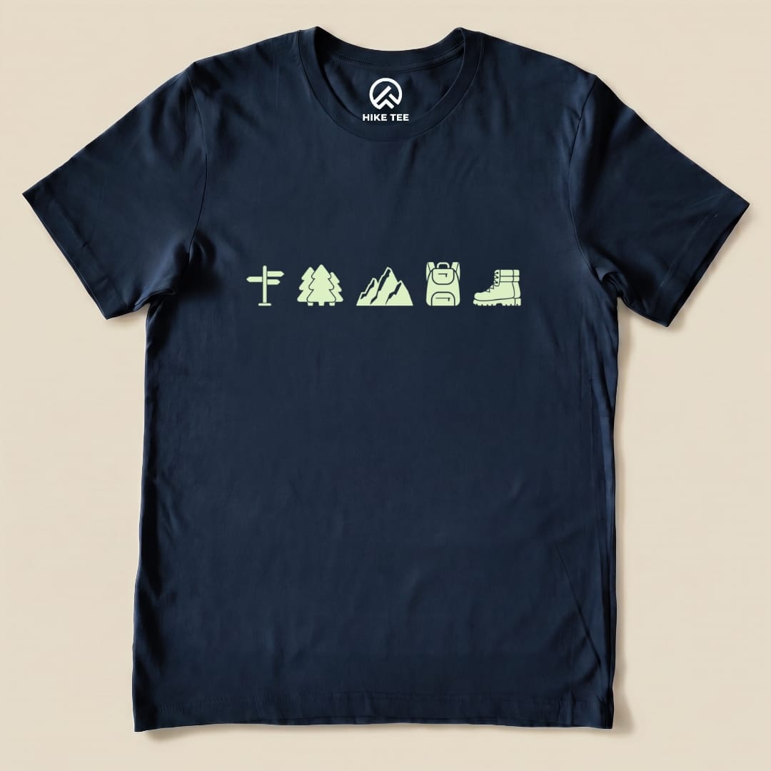 A navy graphic t-shirt, titled "Hiking Mini Shirt," features minimalist icons of a signpost, trees, mountains, a backpack, and hiking boots.