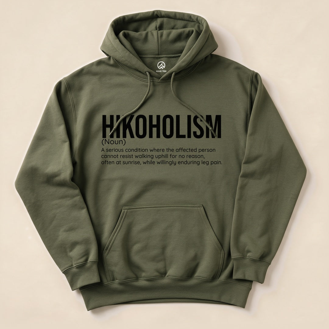 Hikoholism Definition Hoodie featuring the definition of "Hikoholism" in bold text on an olive green hoodie.