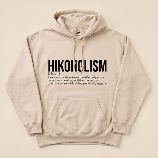 A flat view of the "Hikoholism Definition Hoodie," featuring a humorous definition of hikoholism in bold text.