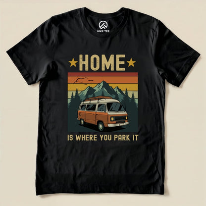 The graphic t-shirt features the phrase "Home Is Where You Park It" with an orange camper van set against a mountain backdrop.