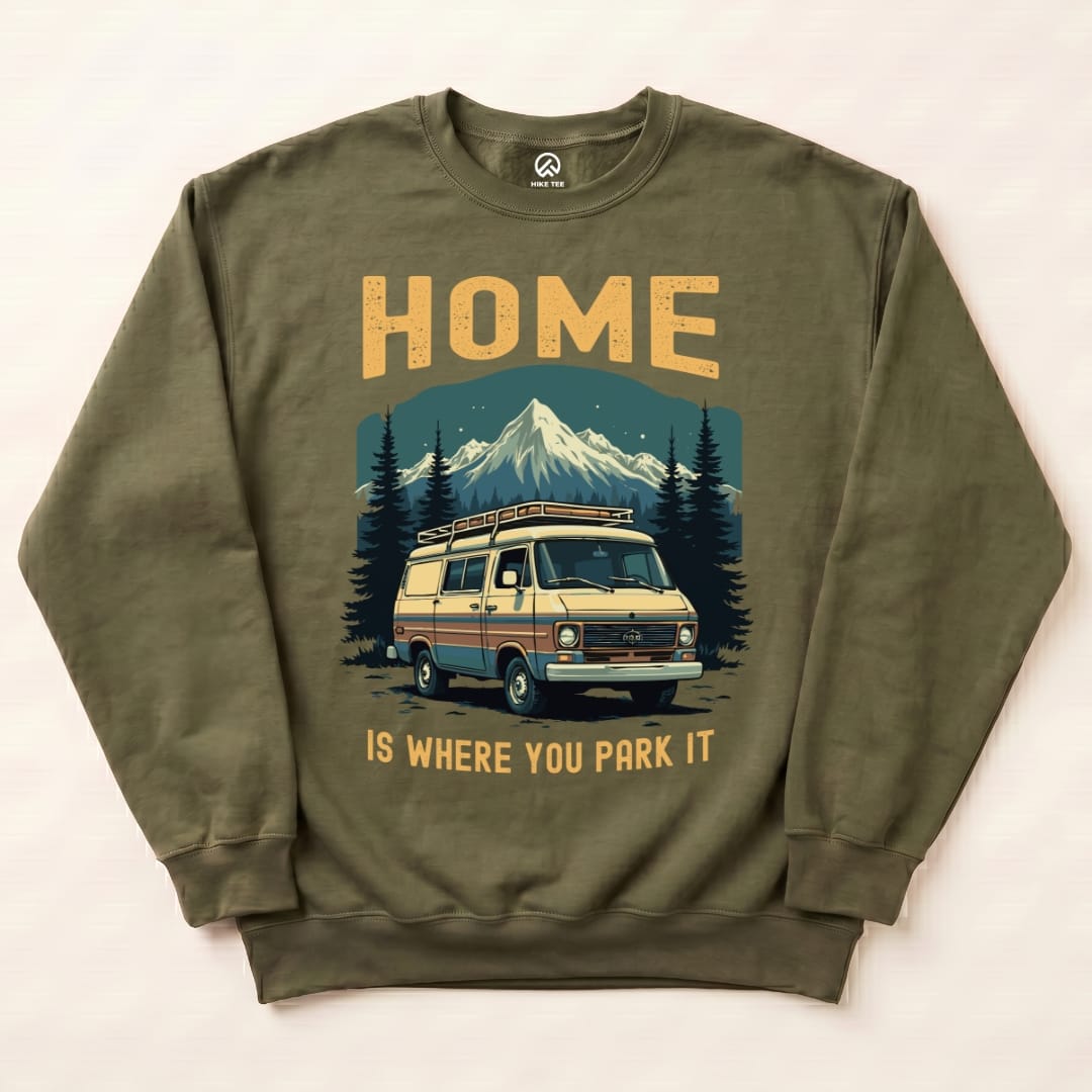 The "Home Parked Sweatshirt" features a vintage camper van set against mountains with the text "HOME IS WHERE YOU PARK IT" above.