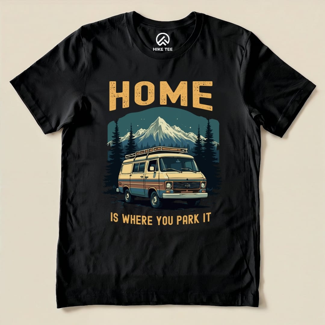 Graphic t-shirt featuring a vintage van, mountains, and trees with the text "HOME IS WHERE YOU PARK IT," titled "Home You Park It Shirt.