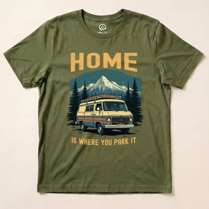 Graphic t-shirt featuring the phrase "HOME IS WHERE YOU PARK IT" above an illustrated camper van and mountain scene.