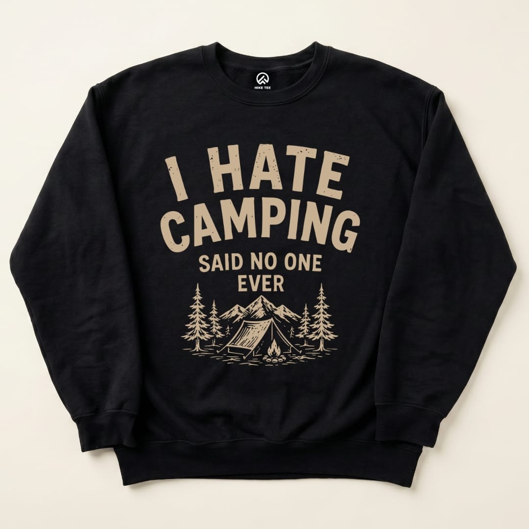 A black "I Hate Camping Sweatshirt" features bold text and graphic elements like mountains, trees, and a campsite illustration.